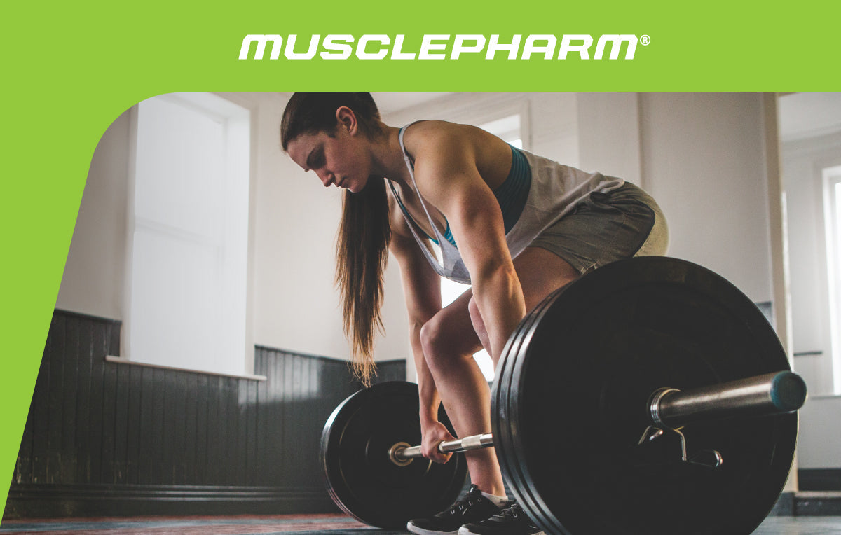 MusclePharm Weekly Workout 04 graphic featuring a female athlete preparing for a heavy barbell deadlift in a gym.