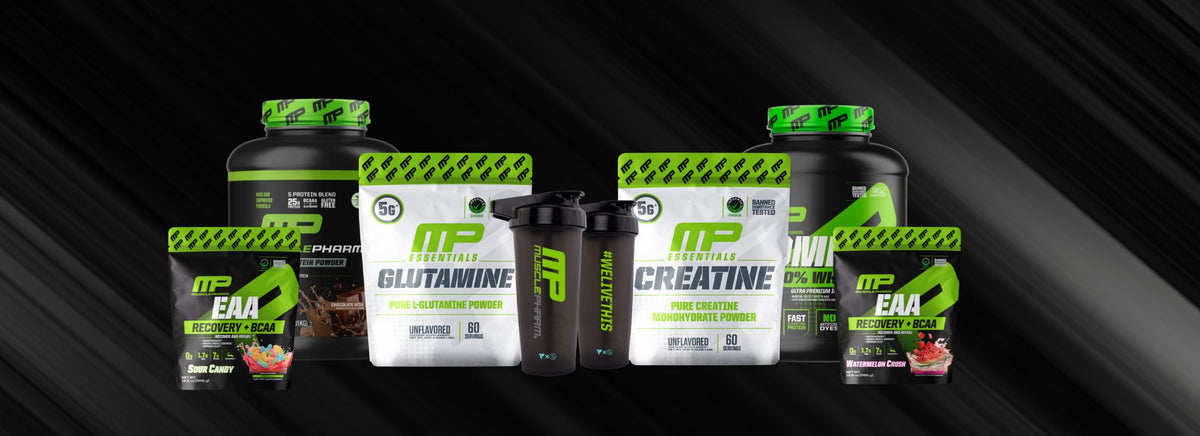 Lineup of MusclePharm supplement containers including Glutamine, Creatine, and EAA with a shaker cup.