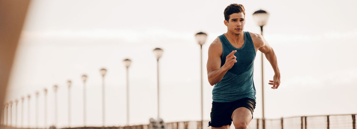 MusclePharm article graphic featuring a male athlete running outdoors along a path titled Explosive Speed Tips.